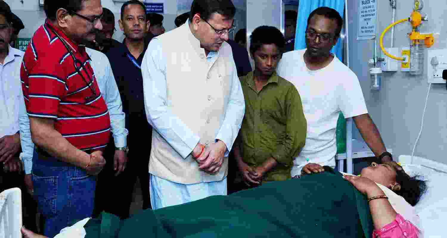 U'khand CM visits hospital, meets food poisoning patients