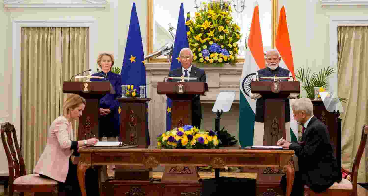 Prime Minister Narendra Modi, European Council President Antonio Costa (centre) and European Commission President Ursula von der Leyen witness exchange of documents during a joint press statement after their meeting at the Hyderabad House in New Delhi on Tuesday.
