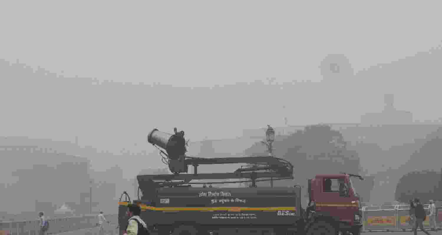 An anti-smog gun being used to spray water droplets to curb air pollution amid smog, in New Delhi.  