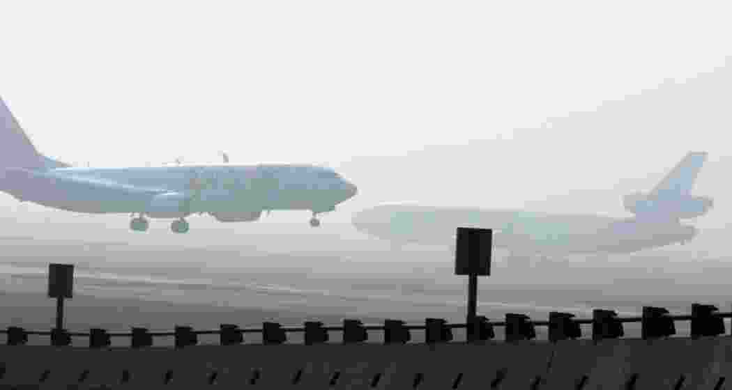 Dense fog envelops Delhi airport, disrupting over 100 flights and slowing traffic, as CAT III-compliant flights continue operations amidst low visibility conditions.Image for representative use only.
