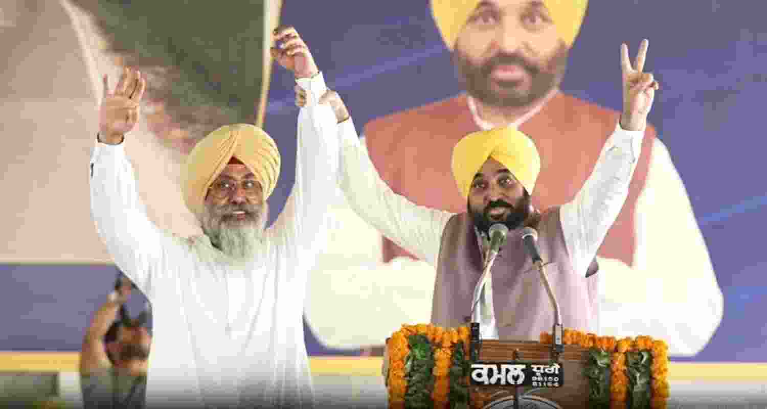 AAP candidate Harmeet Singh Sandhu (left) with Punjab Chief Minister Bhagwant Mann.