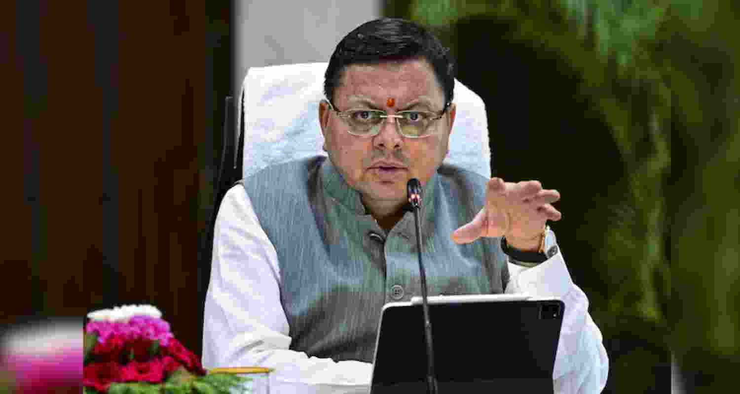 CM Dhami leads roadshow for BJP's Raaj Kumar Anand in Delhi
