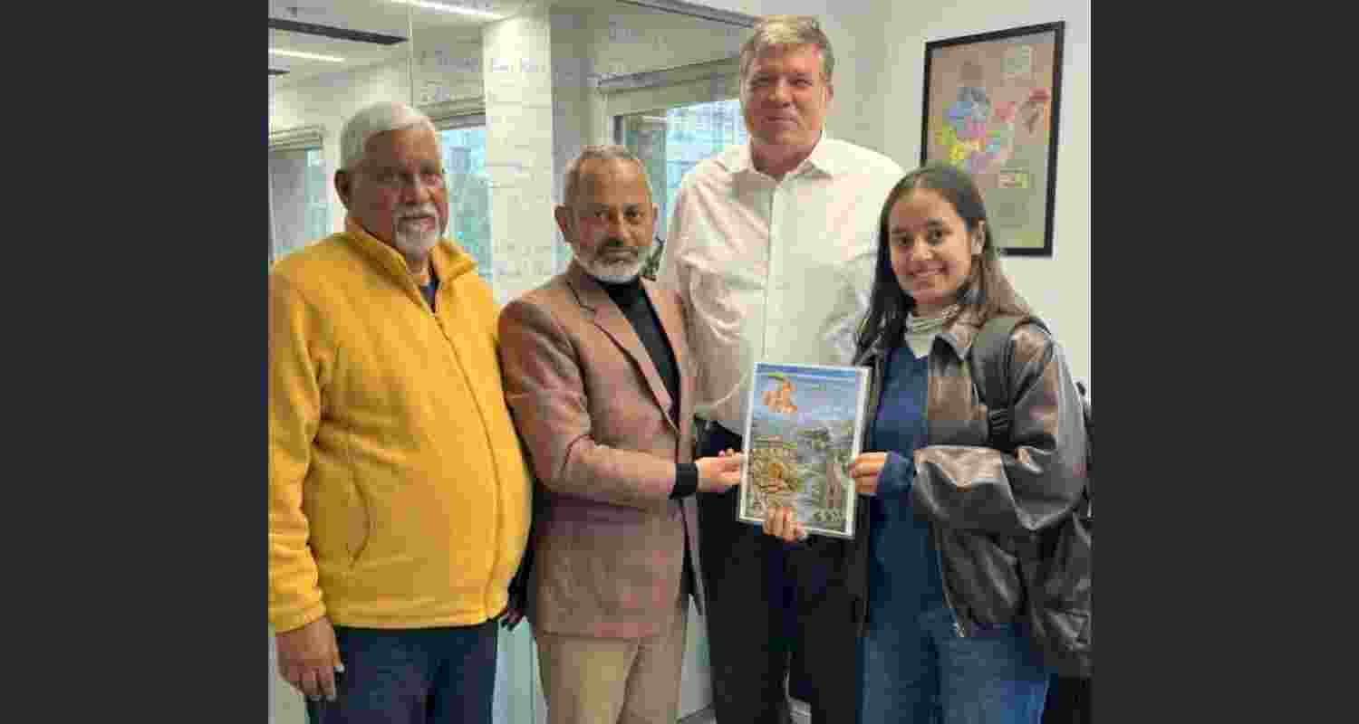 Dr Arya with UNESCO Programme Specialist.