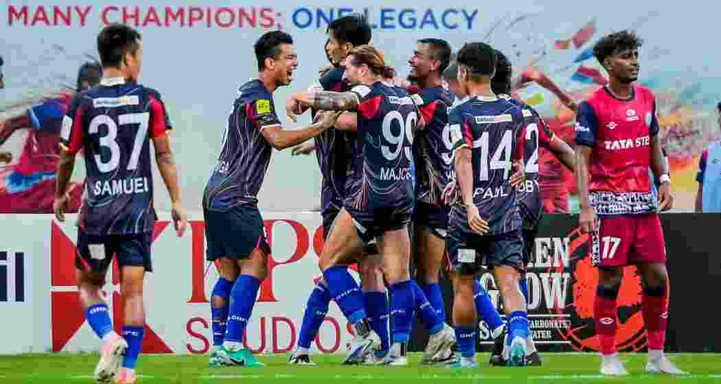 Diamond Harbour players celebrate after scoring a goal.