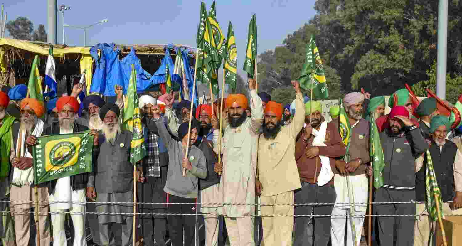 Farmers gather at Shambhu border ahead of their Delhi march, in Patiala district, Punjab, Friday.