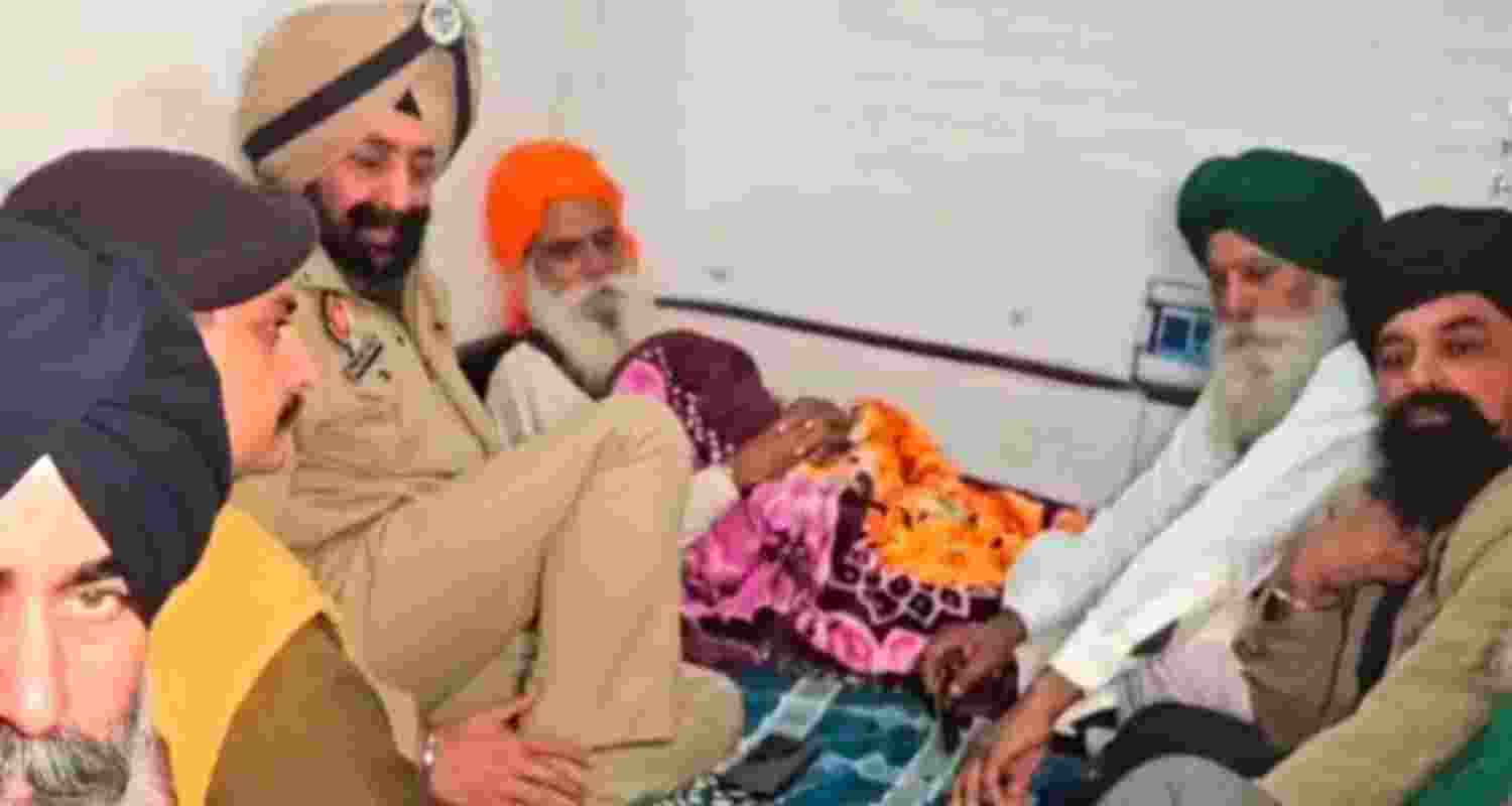 DIG (Patiala range) Mandeep Singh Sidhu with farmer leader Jagjit Singh Dallewal near Khanauri.