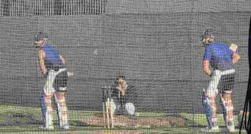 Virat Koli and (right) Rohit Sharma during a net session in Perth on Thursday.