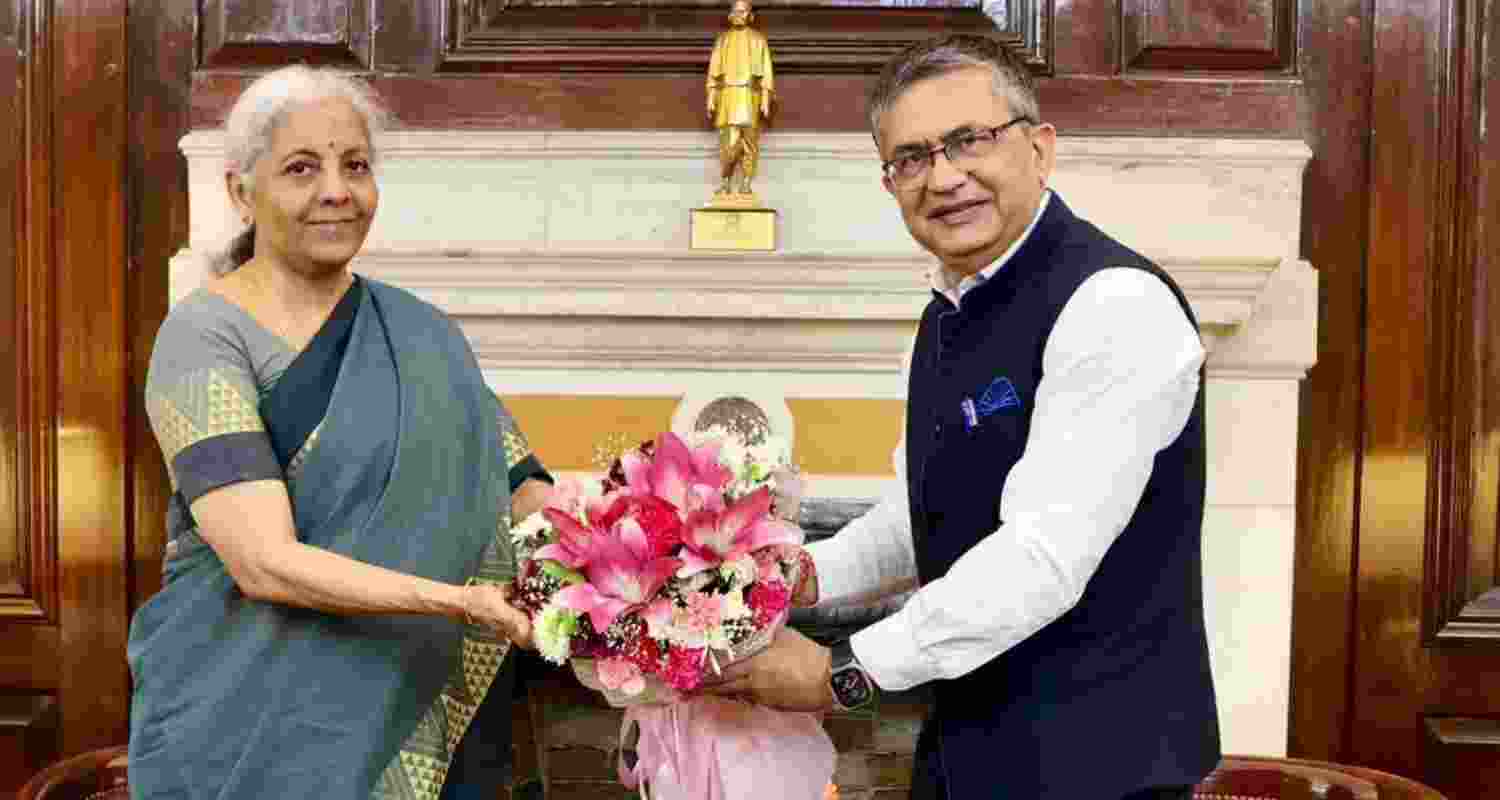 NSE MD and CEO Ashishkumar Chauhan greets FM Nirmala Sitharaman on Wednesday. 