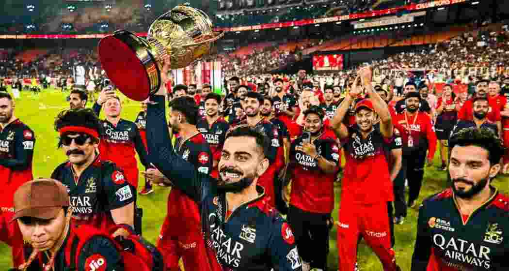 A file photograph of the RCB team celebrating their IPL title.