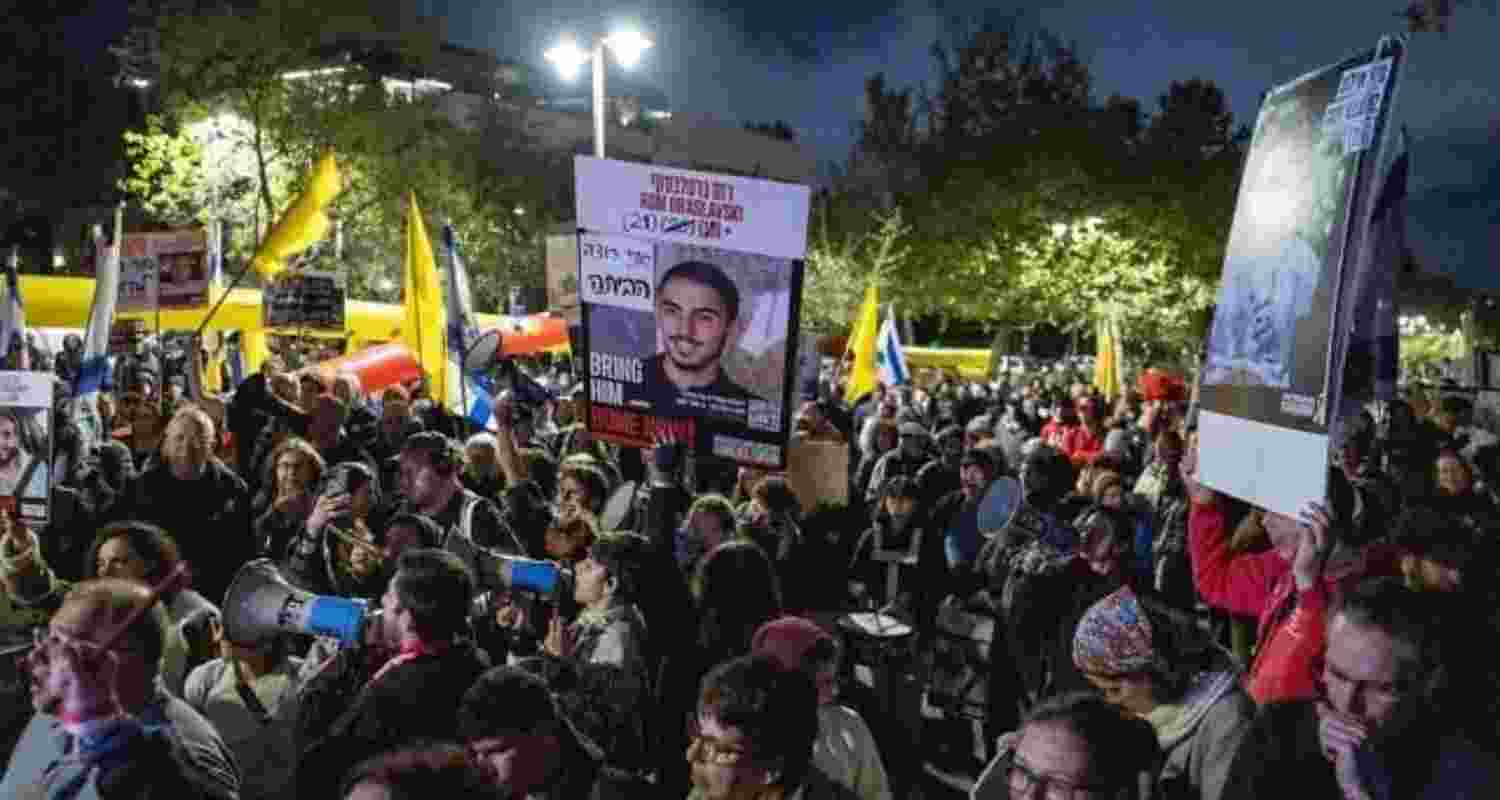 Families of Israelis held hostage in Gaza and supporters protest for the release of hostages, outside the home of Minister of Strategic Affairs Ron Dermer, in Jerusalem, on April 13, 2025. Image: X