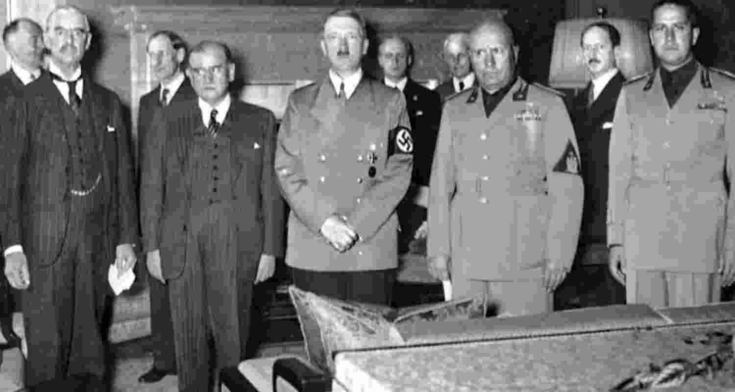 (From left to right): Neville Chamberlain, Édouard Daladier, Adolf Hitler, Benito Mussolini, and Italian Foreign Minister Galeazzo Ciano before signing the Munich Agreement, which gave the Sudetenland to Germany.