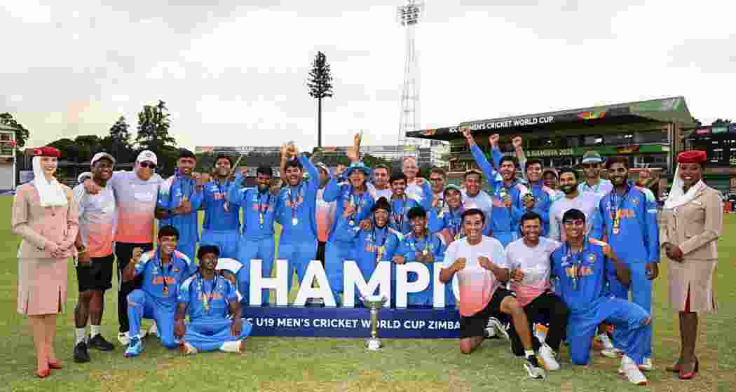 India’s Under-19 team members celebrate after clinching the World Cup title at the Harare Sports Club in Zimbabwe on Friday.
