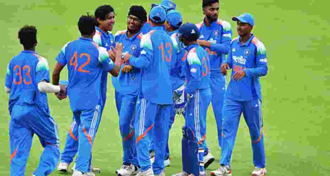 India Under-19 cricketers celebrate after their victory. 