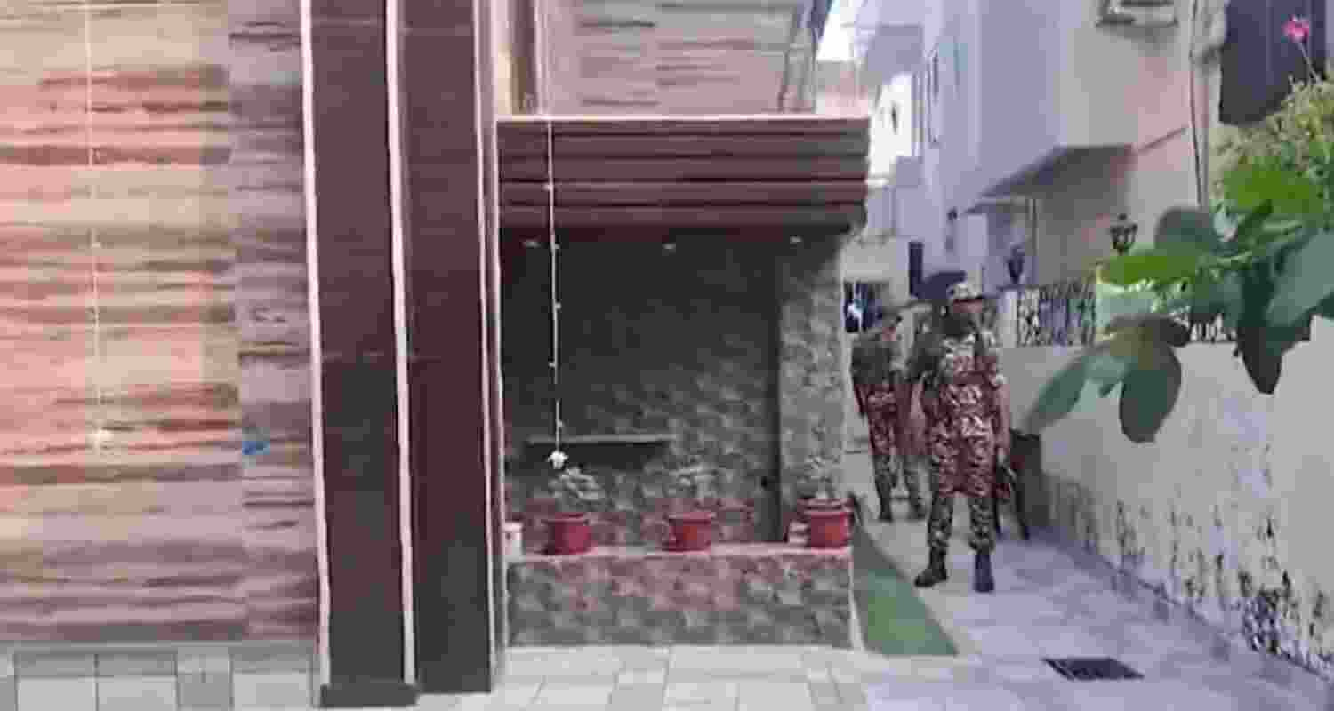 Security personnel at Sunil Srivastava's residence. Screengrab via X.
