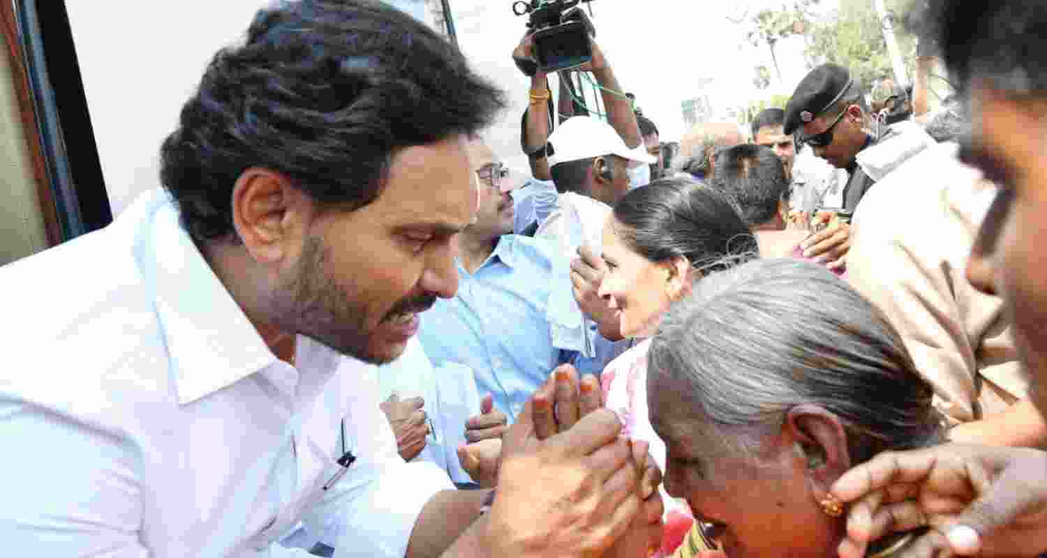 YSRCP chief YS Jagan Mohan Reddy with locals.