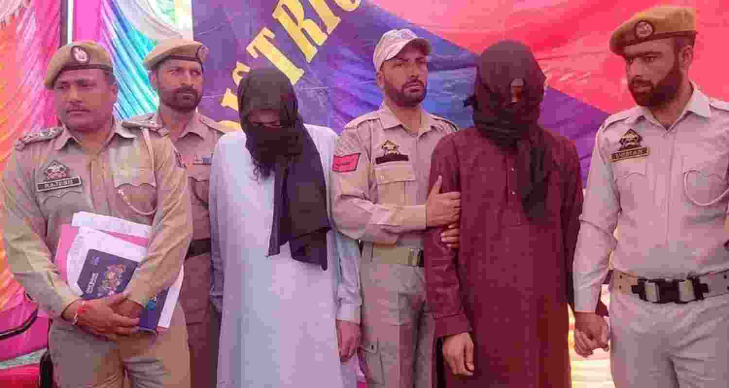 Police in Poonch with the two arrested terrorists.