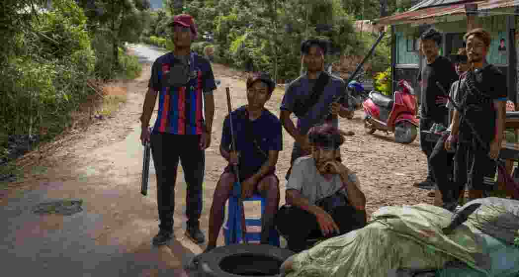 Kuki militants stand guard at a checkpoint in Torbung village. Representative image.
