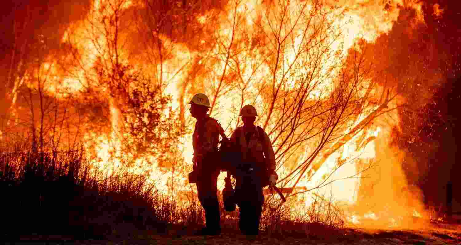 Fire crews battle the Kenneth Fire in the West Hills section of Los Angeles, Thursday, Jan. 9, 2025.