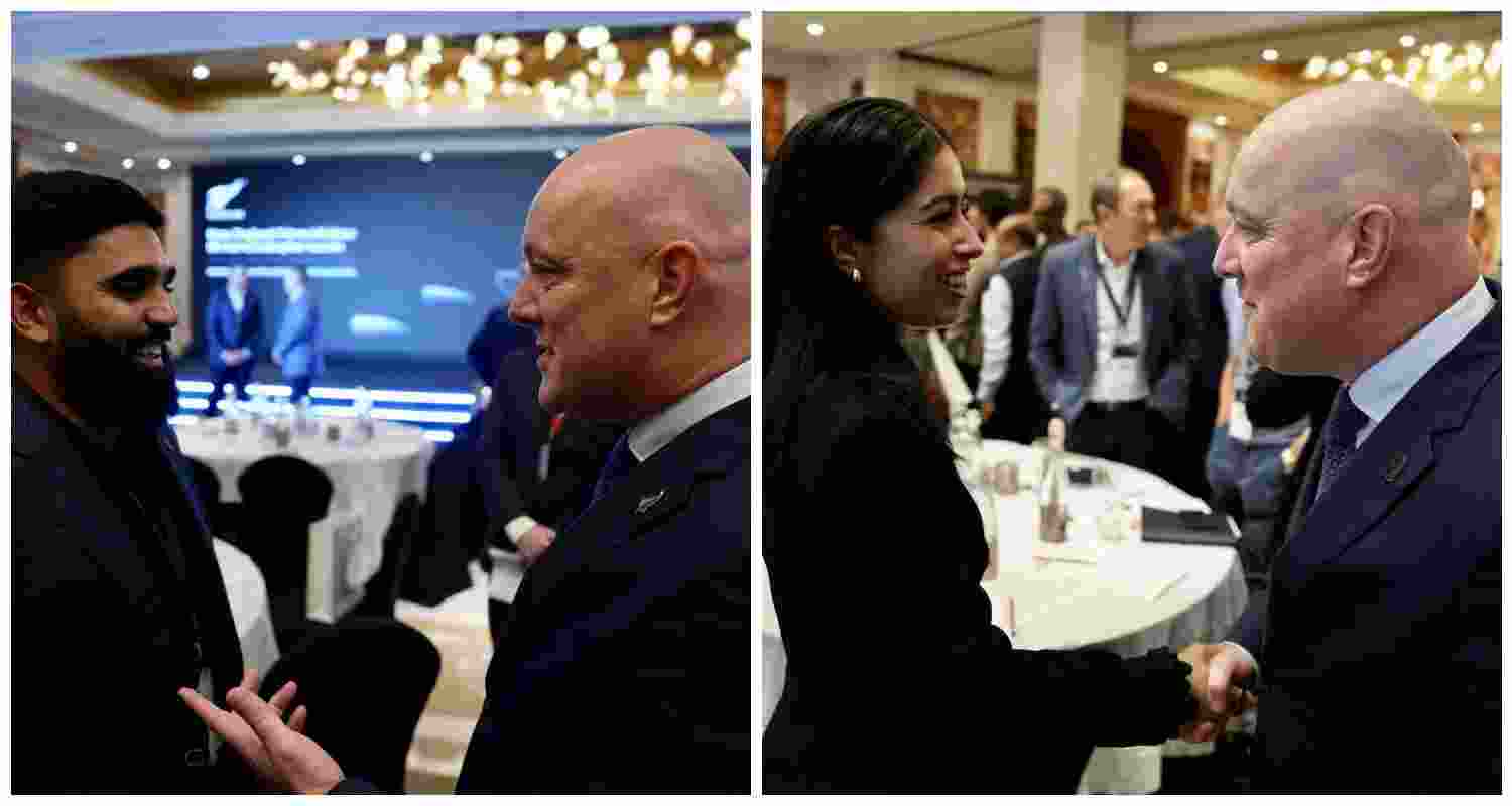 New Zealand Prime Minister Christopher Luxon interacts with community and business leaders during his visit to India, where he is set to deliver the keynote address at the Raisina