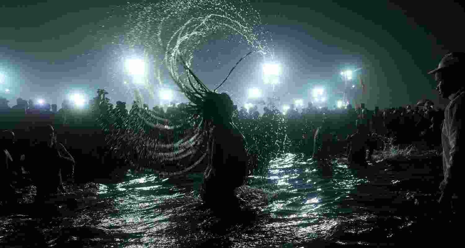 Saints and seers and seers from Akharas taking holy dip in Triveni Sangam on the occasion of Basant Panchami during the Maha Kumbh Mela, in Prayagraj, Monday.