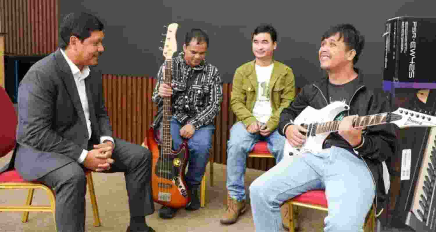 Meghalaya Chief Minister, Conrad K Sangma with members of the Eastern Brook Band. 