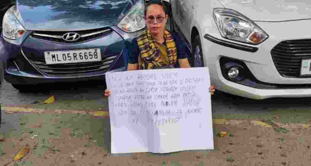 Bindas Syiem in front of the secretariat on Thursday.