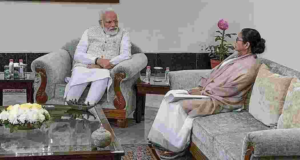 File photo of PM Narendra Modi with West Bengal CM Mamata Banerjee.