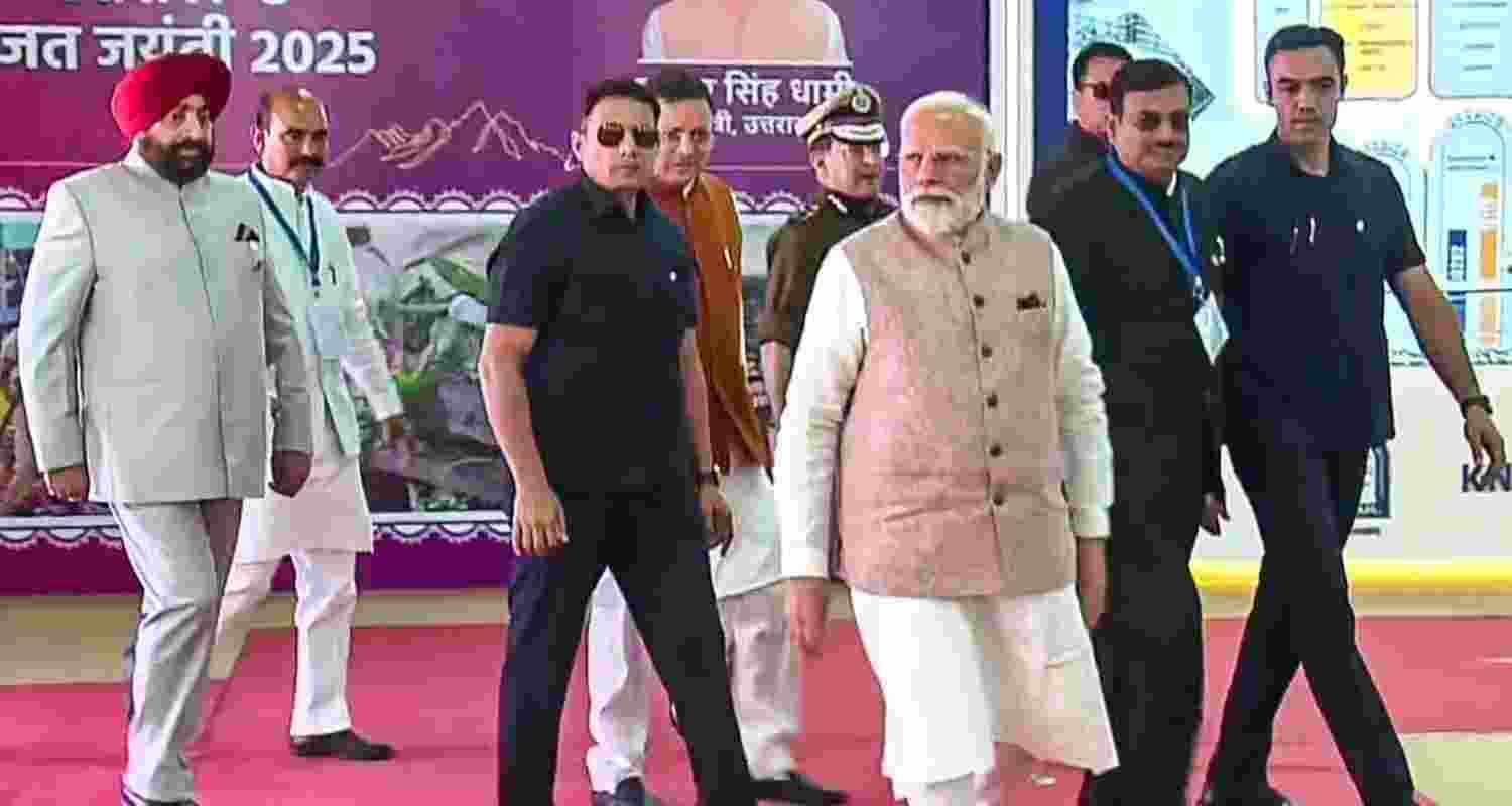 Prime Minister Narendra Modi during the inauguration of an exhibition during the silver jubilee celebration marking the formation of Uttarakhand. State Governor Lt Gen Gurmit Singh (Retd) with state Chief Minister Pushkar Singh Dhami also seen.