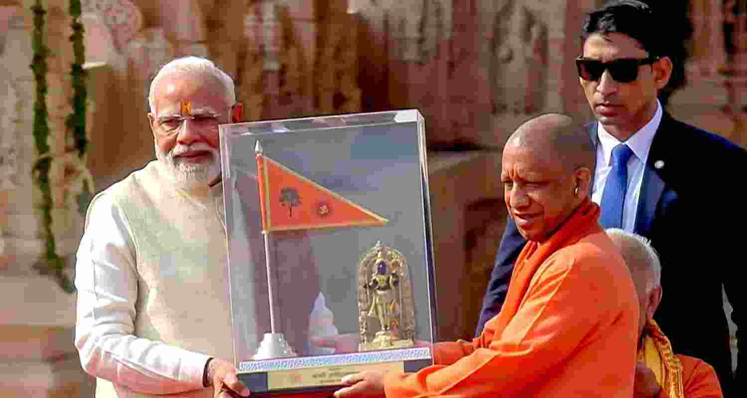 Prime Minister Narendra Modi with Uttar Pradesh Chief Minister Yogi Adityanath during the 'Dhwajarohan' ceremony at the Ram Temple, in Ayodhya, Uttar Pradesh. 