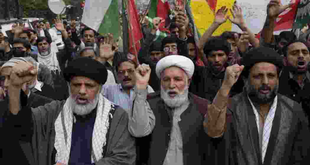 Protestors chant slogans to condemn the killing of Shiite Muslims by gunmen in an ambush in Kurram district, during a demonstration in Lahore, Pakistan, Friday, Nov. 22, 2024.