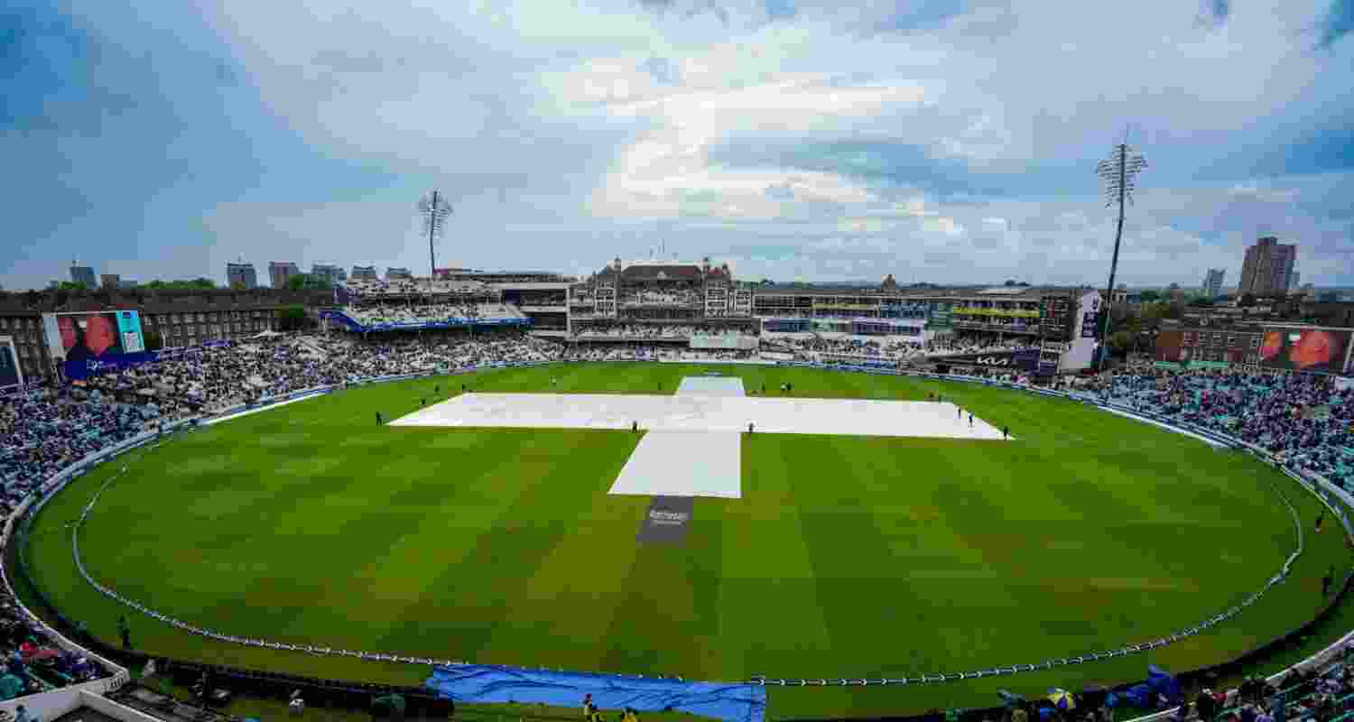 The covered pitch at The Oval in London as rain halted play twice on the first day of the fifth Test match between India and England on Thursday.