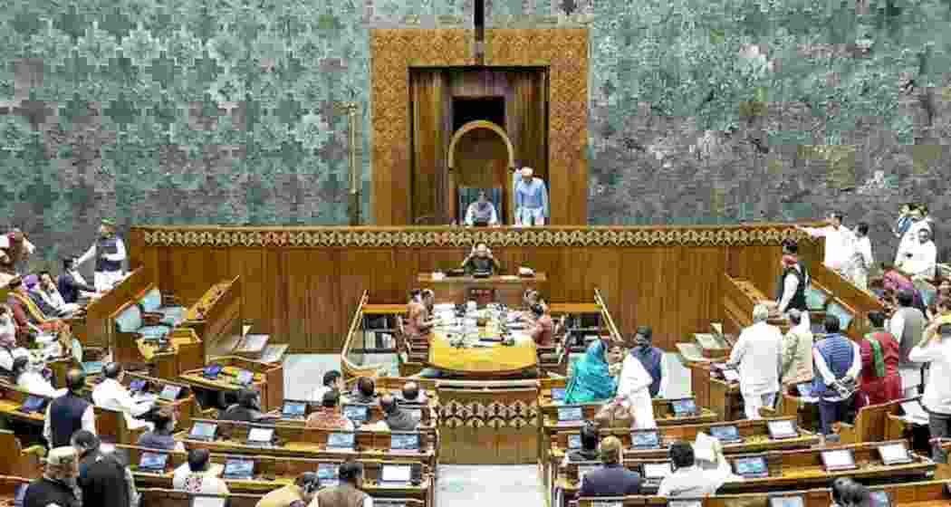 Members in the Lok Sabha during the Winter session of Parliament, in New Delhi.