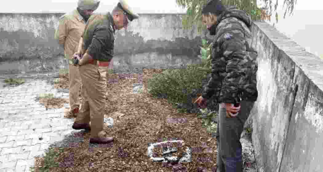 Senior police officers examining the encounter site in Fazilka.
