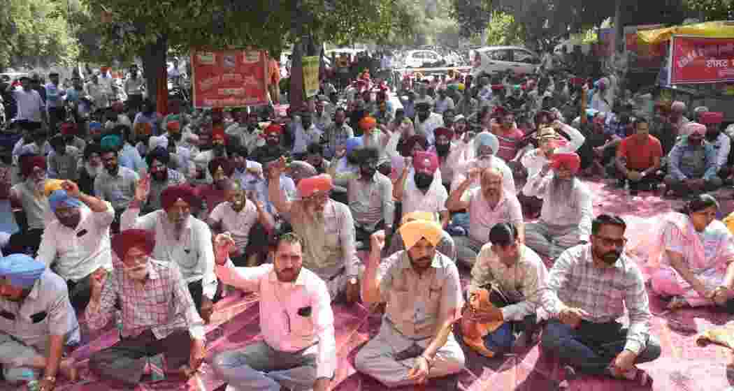 Punjab State Power Corporation Limited (PSPCL) employees holding a protest against the state government's move to sell PSPCL land. (File photo)
