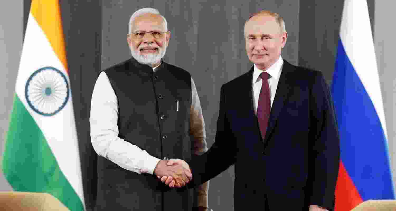 A file photo of Vladimir Putin and Narendra Modi.