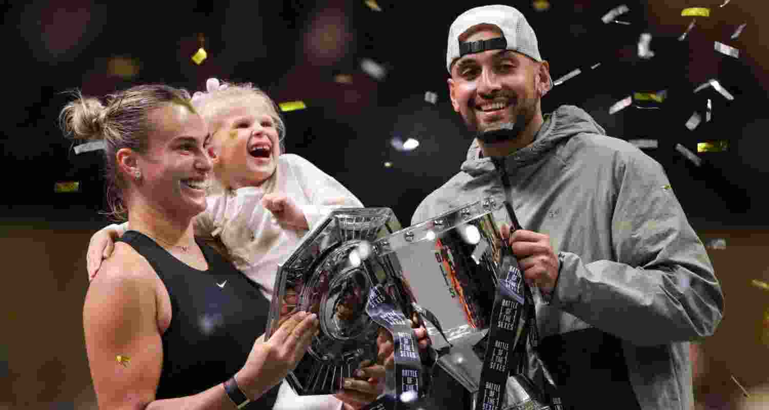 Aryna Sabalenka celebrating with Nick Kyrgios after their match.