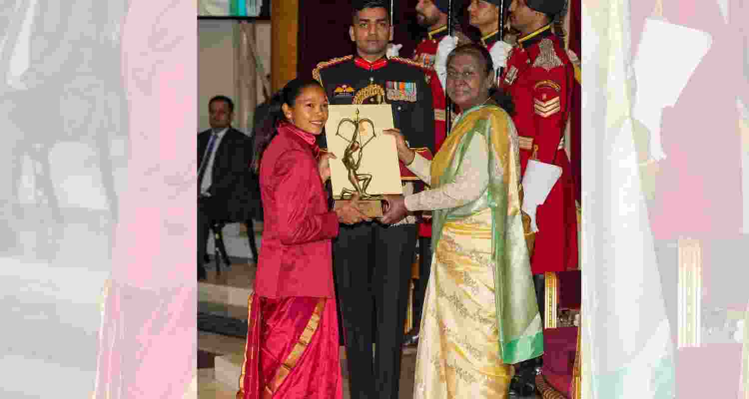 President Droupadi Murmu confers Arjuna Award on Salima Tete in recognition of her outstanding achievements in Hockey during the National Sports and Adventure Awards 2024 function at the Rashtrapati Bhavan, in New Delhi, Friday.