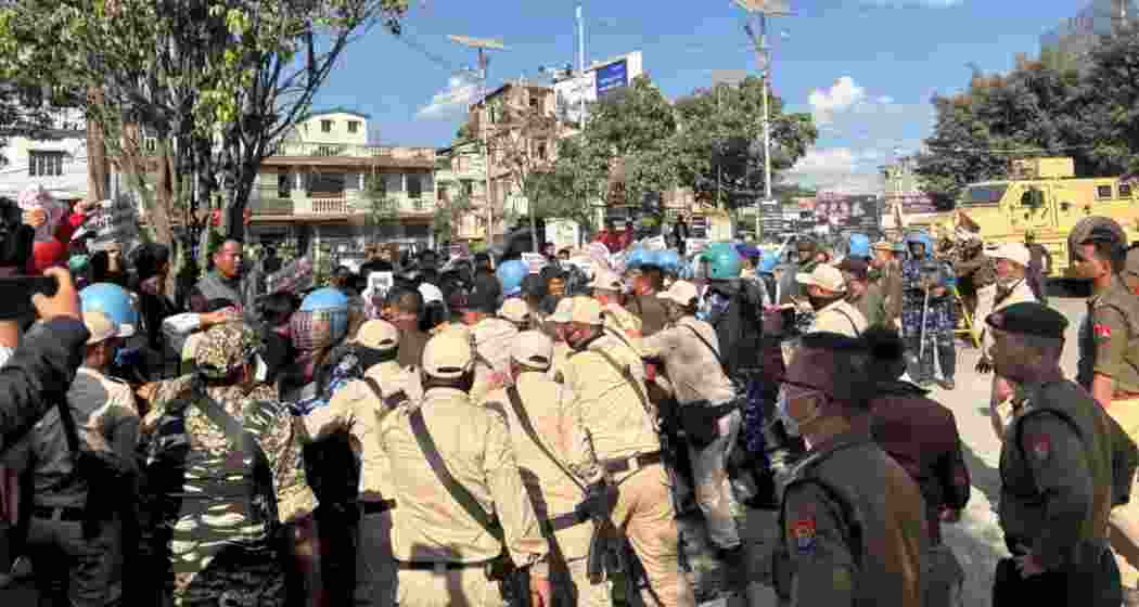Protesters attempt to march toward the Sangai festival venue in Imphal.