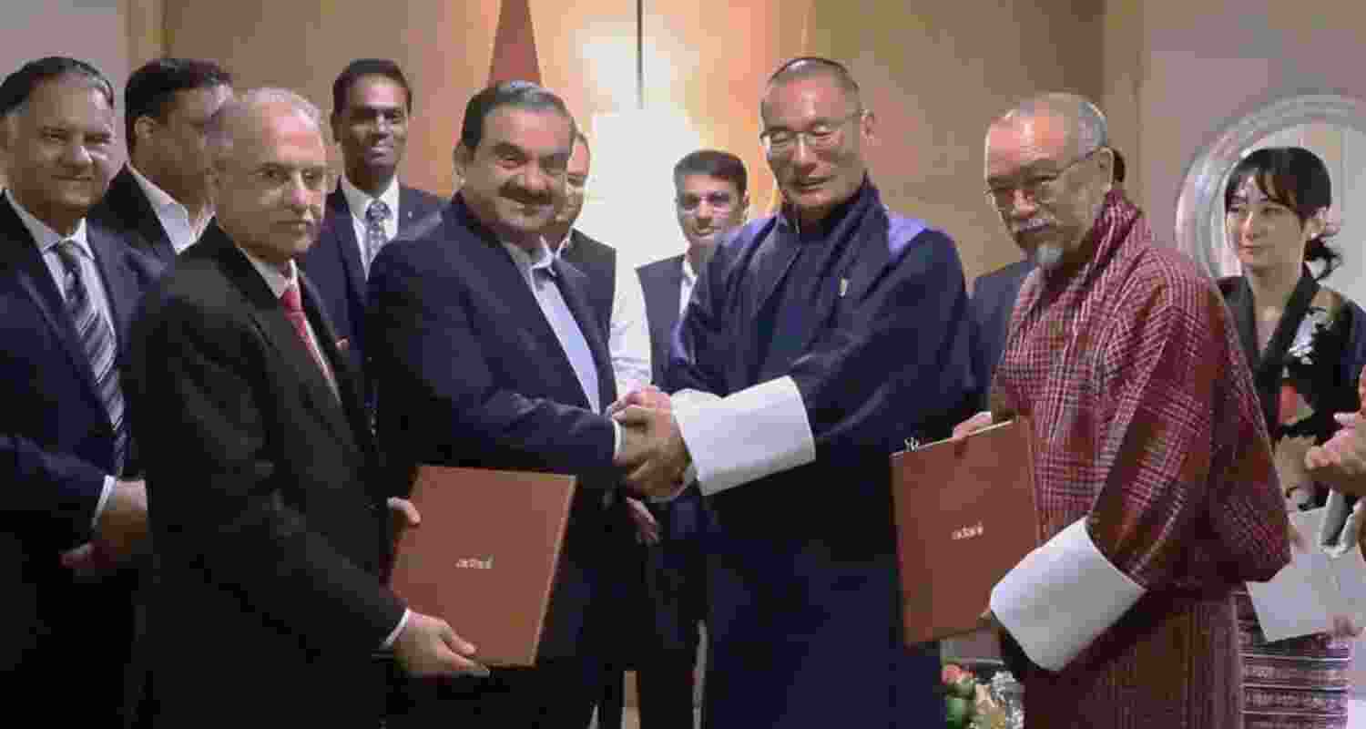 Adani Group chairman Gautam Adani and Bhutanese Prime Minister Dasho Tshering Tobgay after signing the agreement.