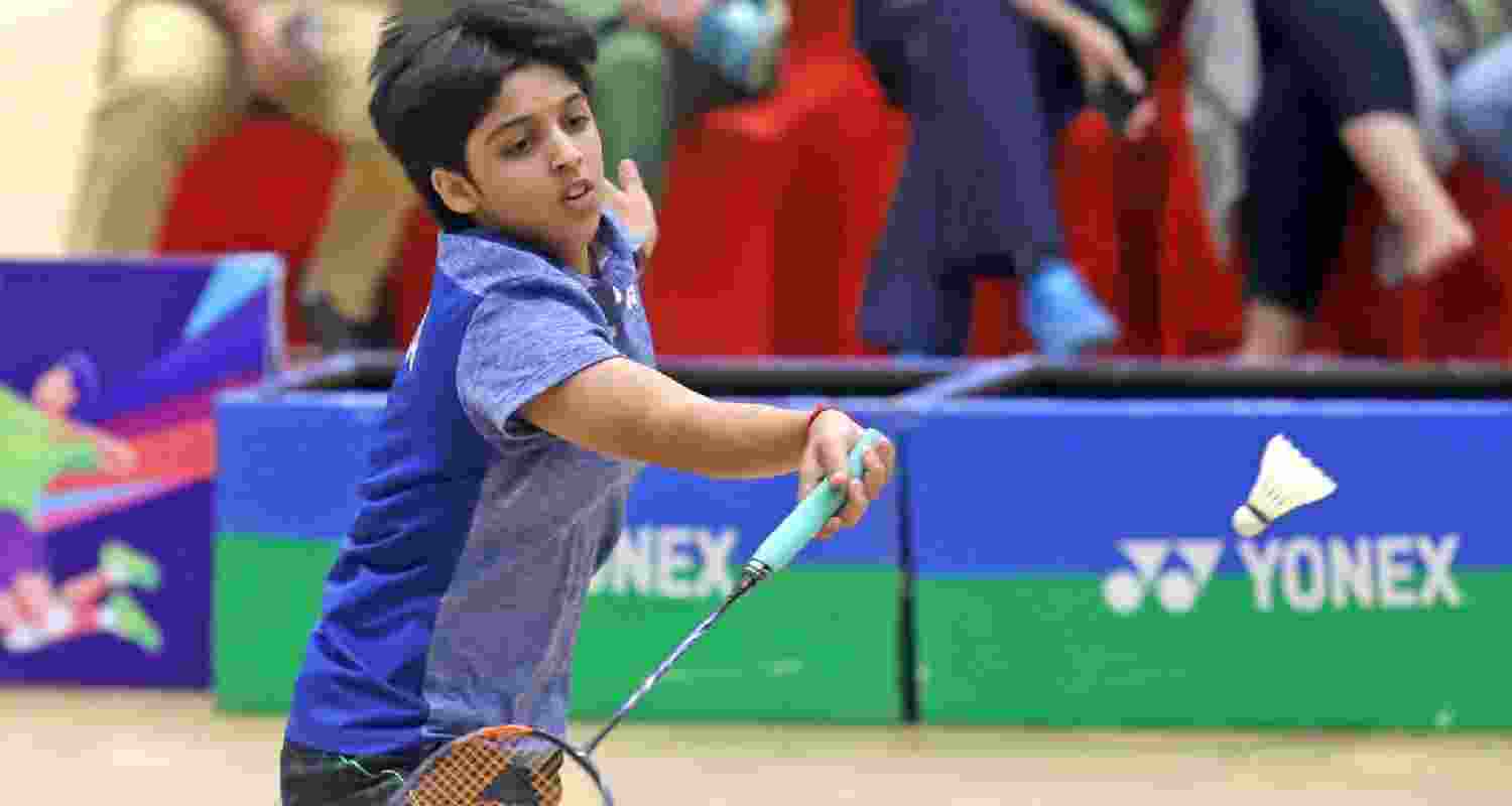 Tanvi Sharma fought back brilliantly to shock second seed Okuhara 13-21 21-16 21-19 in a 59-minute thriller.