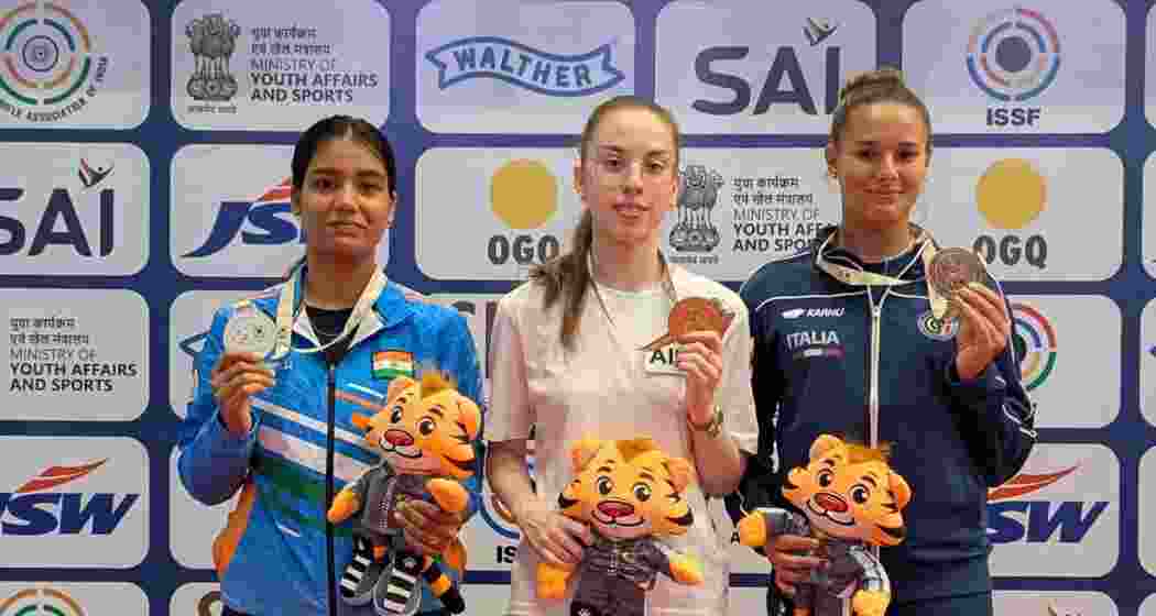 Tejaswani Singh (extreme left) after winning a silver in the 25m pistol on Wednesday.