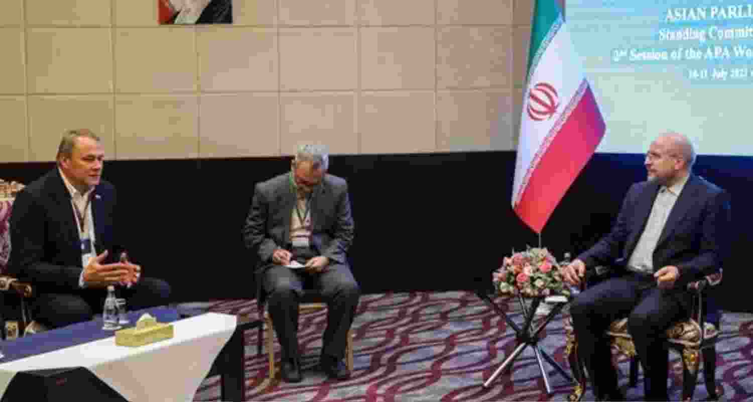 Iran’s parliament speaker warns of missile strikes on US bases if Washington intervenes as mass protests over economic crisis escalate across the country.