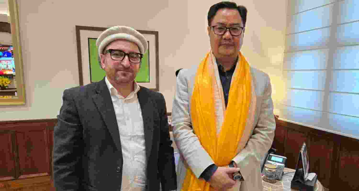 Ladakh-based political activist Sajjad Hussain Kargil and Minority Affairs Minister Kiren Rijiju. Image: X.