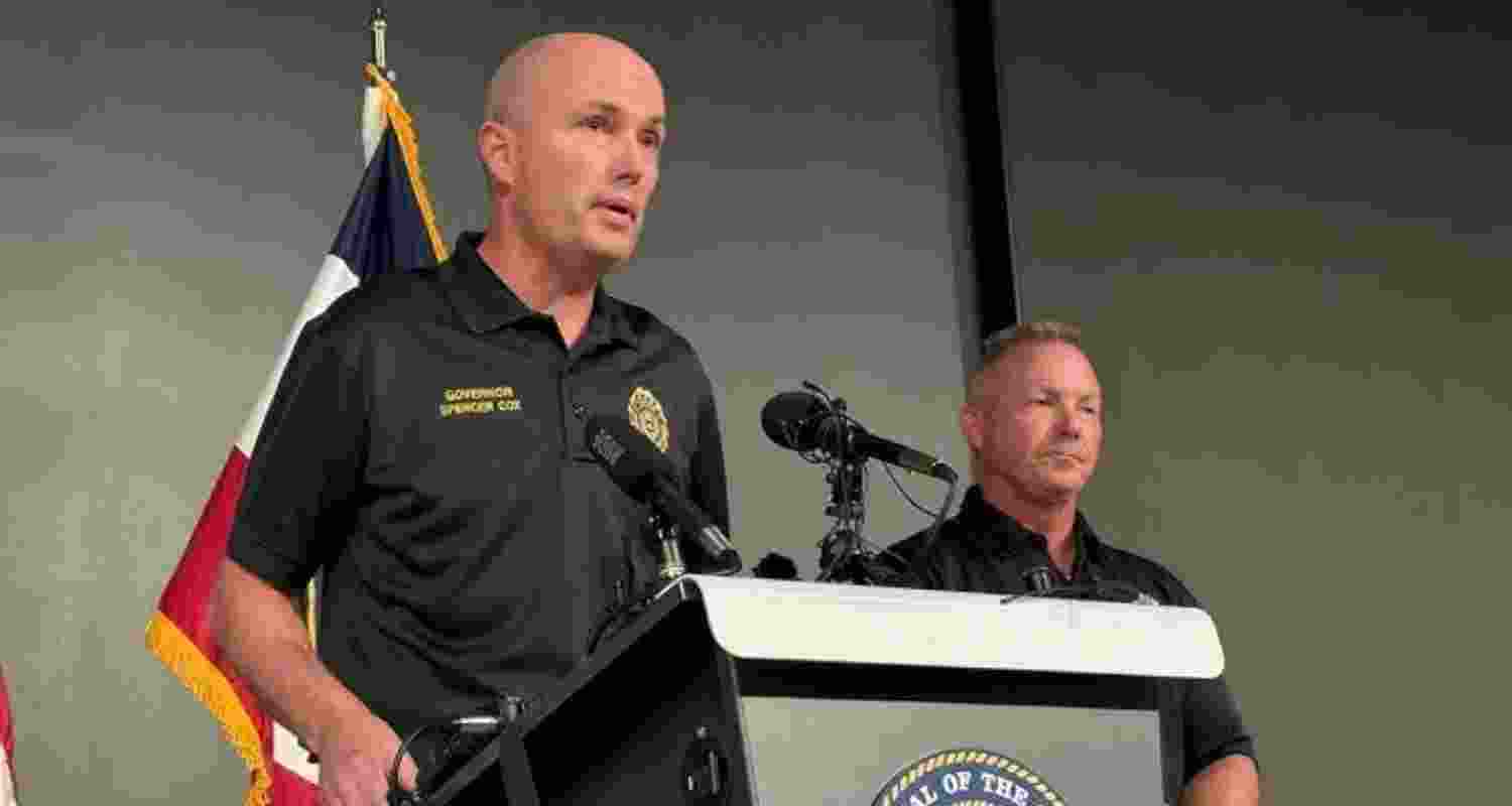 Utah governor Spencer Cox at a earlier press conference, on Wednesday. Authorities are still searching for the suspect in the Charlie Kirk shooting. 