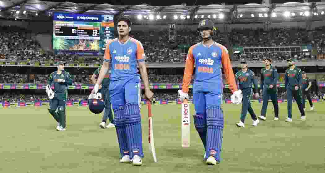  Openers Abhishek Sharma and Shubman Gill leaving the field after rain stopped play when India were cruising at 52 for no loss in 4.5 overs.