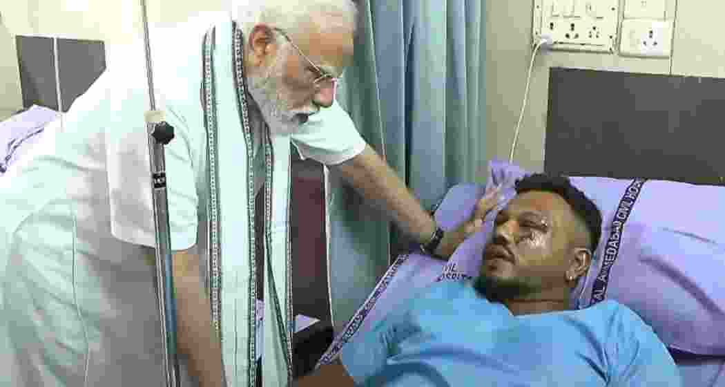Prime Minister Narendra Modi meets Vishwas Kumar Ramesh, the lone survivor of the Ahmedabad plane crash, at the Civil Hospital to enquire about his health and recovery progress.