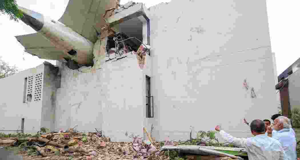 PM Narendra Modi visits AI crash site in Ahmedabad on 13 June.