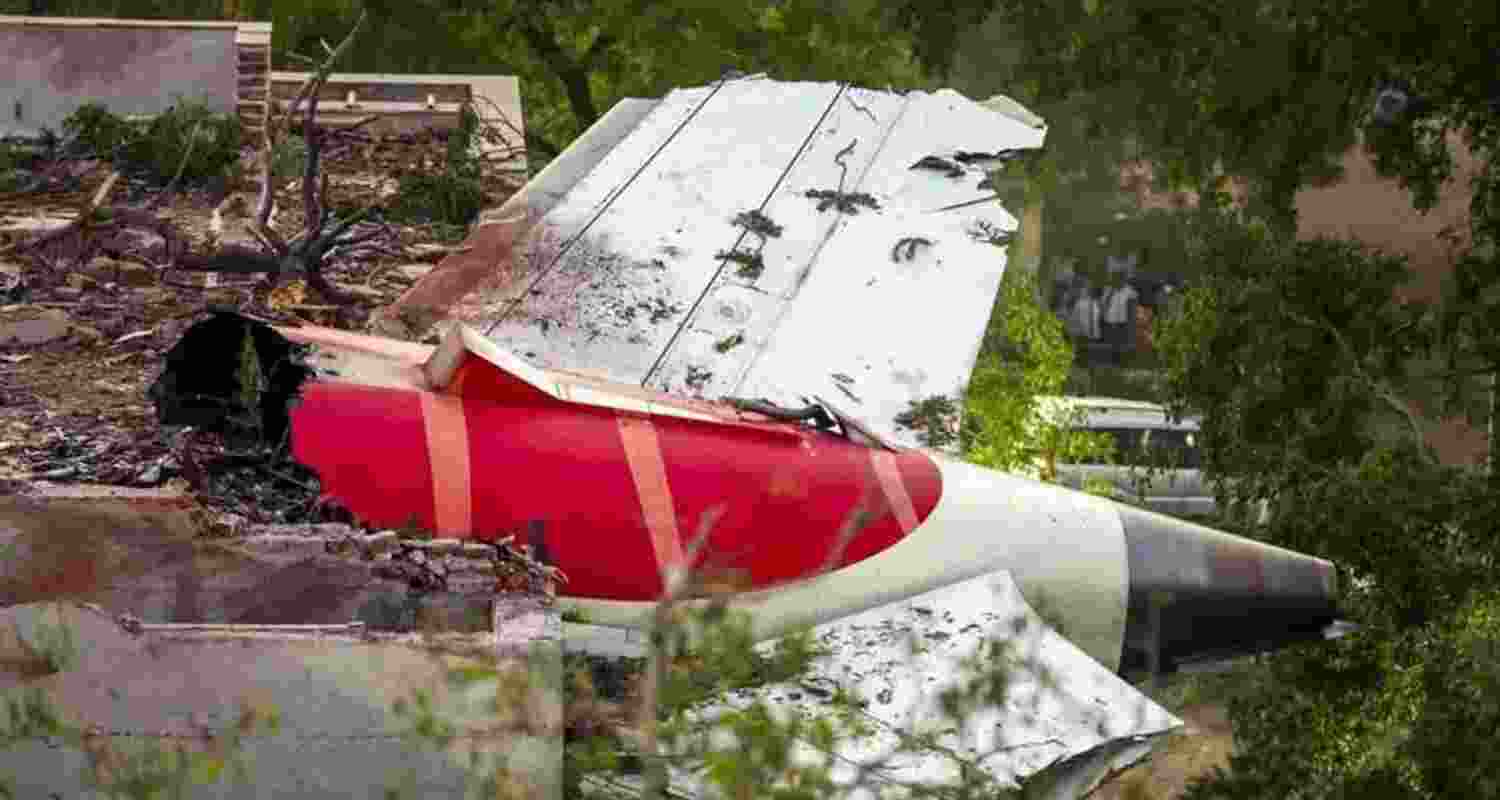 Wreckage showing the tail section of the crashed Air India Boeing 787-8 jet.
