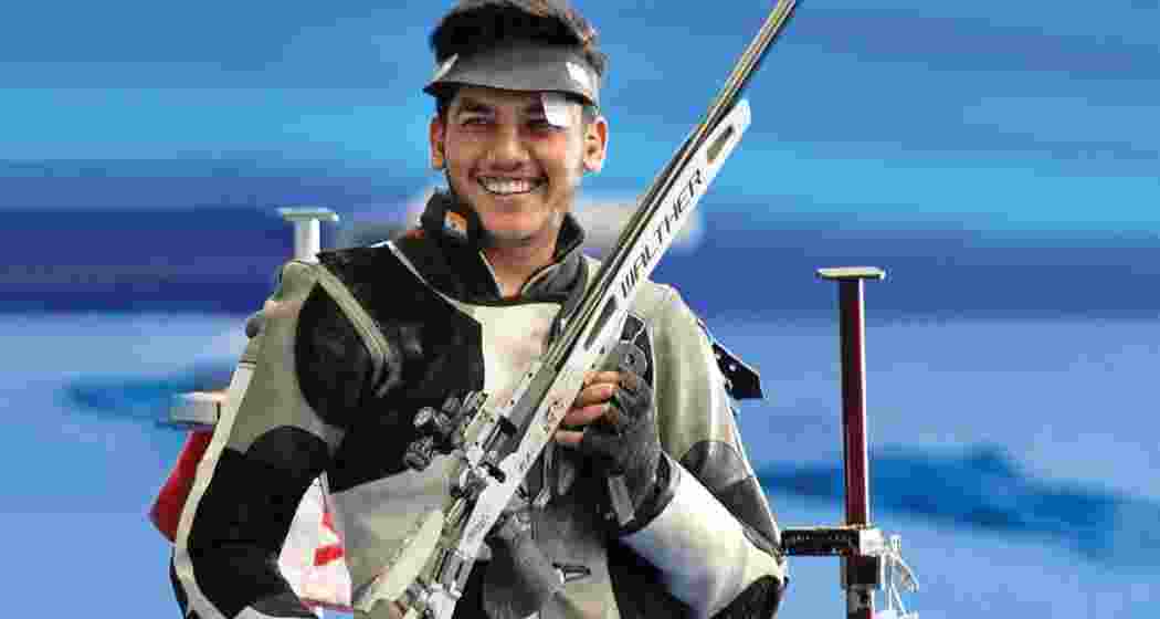 Aishwary Pratap Singh Tomar beams after winning gold.
