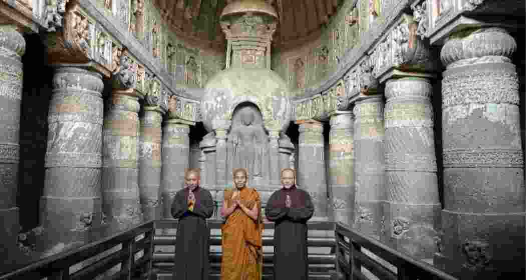 Buddhist monks at Cave 19, one of the most popular caves at Ajanta.